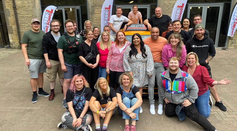 The cast and crew of Scarlett's Driving School