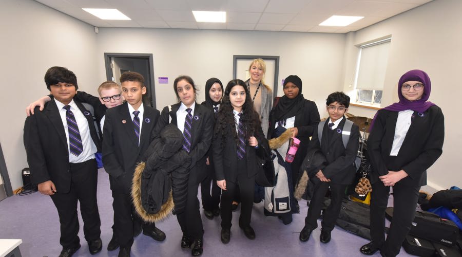 An image of a group of school children stood together