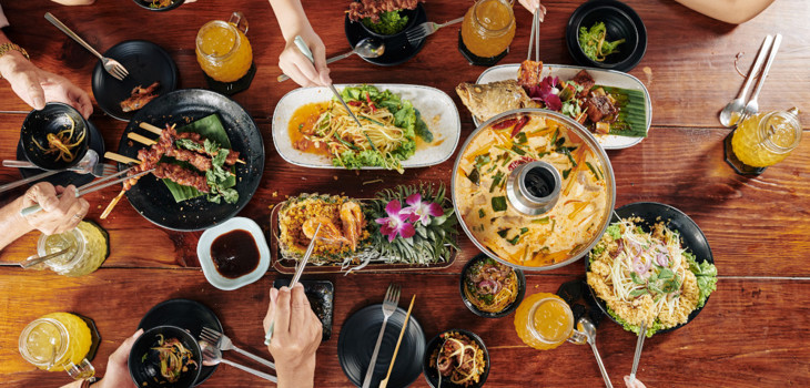 A group of people enjoying food